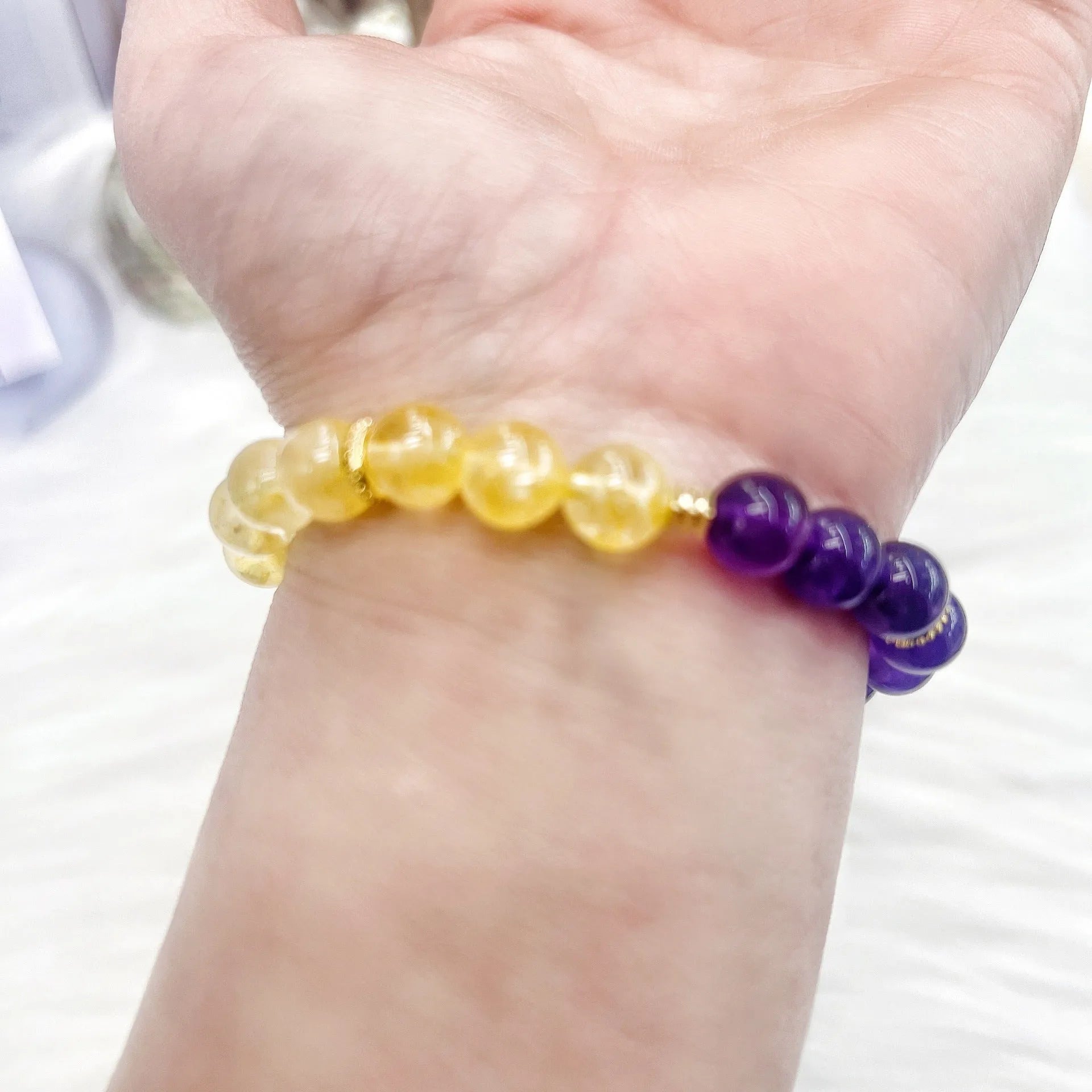 Handmade women's yellow and purple crystal amethyst bracelet with manual craftsmanship