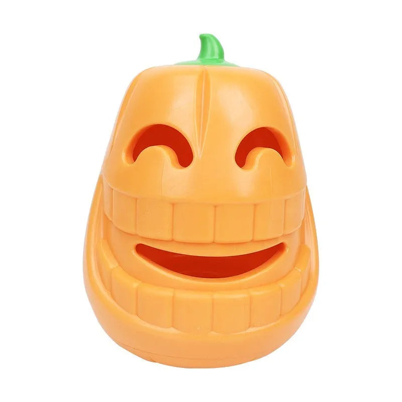 Orange Halloween pumpkin shaped interactive dog chew toy with treat-dispensing funnel.