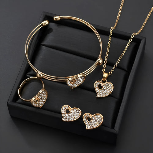 Gold electroplated women's jewellery set with love bell patterns including earrings, pendant and adjustable bracelet
