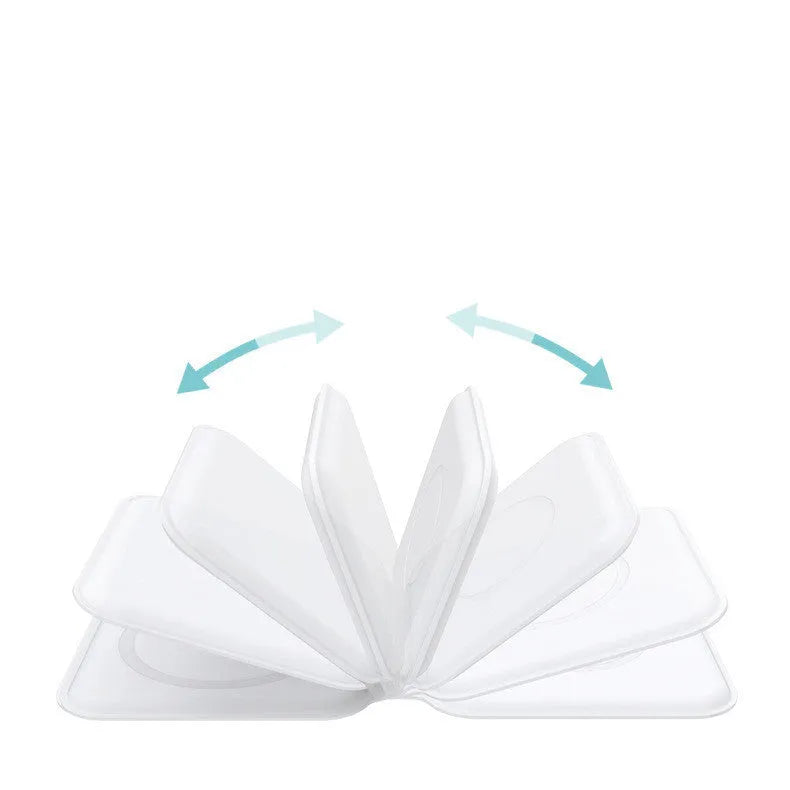 White folding magnetic wireless charger showing angled stand position with phone charging