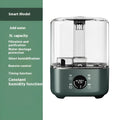 Green KC-112 touch screen intelligent humidifier with remote control on a table.