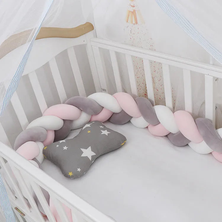 Baby crib bumper in crystal velvet with braid knot design showing flexible length options for cot protection