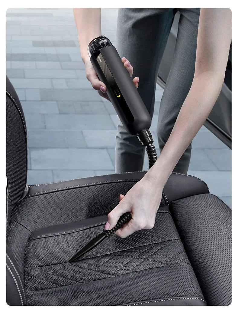 BASEUS wireless handheld car vacuum cleaner in black, white, or green, showing compact size and blowing hose attachment.