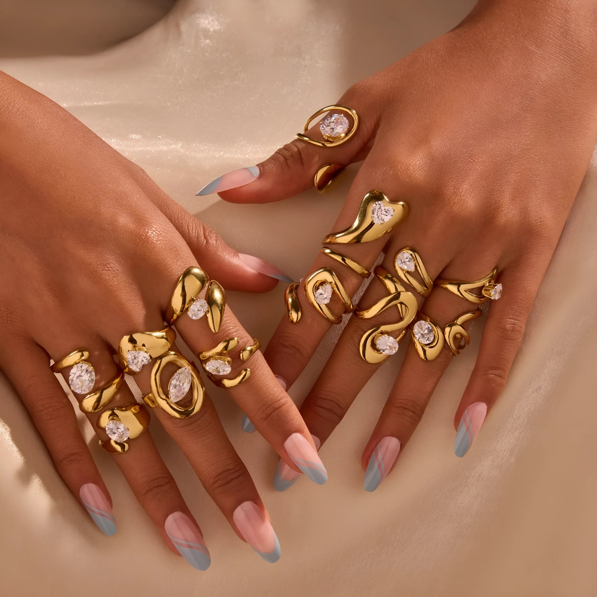Geometric zircon ring with stainless steel construction and open mouth design in electroplated finish