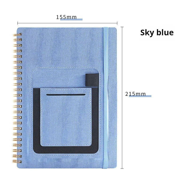 Erasable coil notebook with stone paper, showing a black cover option and a pen on a wooden desk.