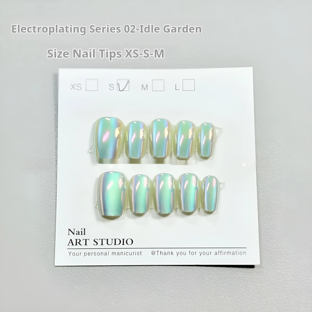 Set of electroplated Cat's Eye false nails in short ladder shape showing Aurora armour and solid colour finishes.