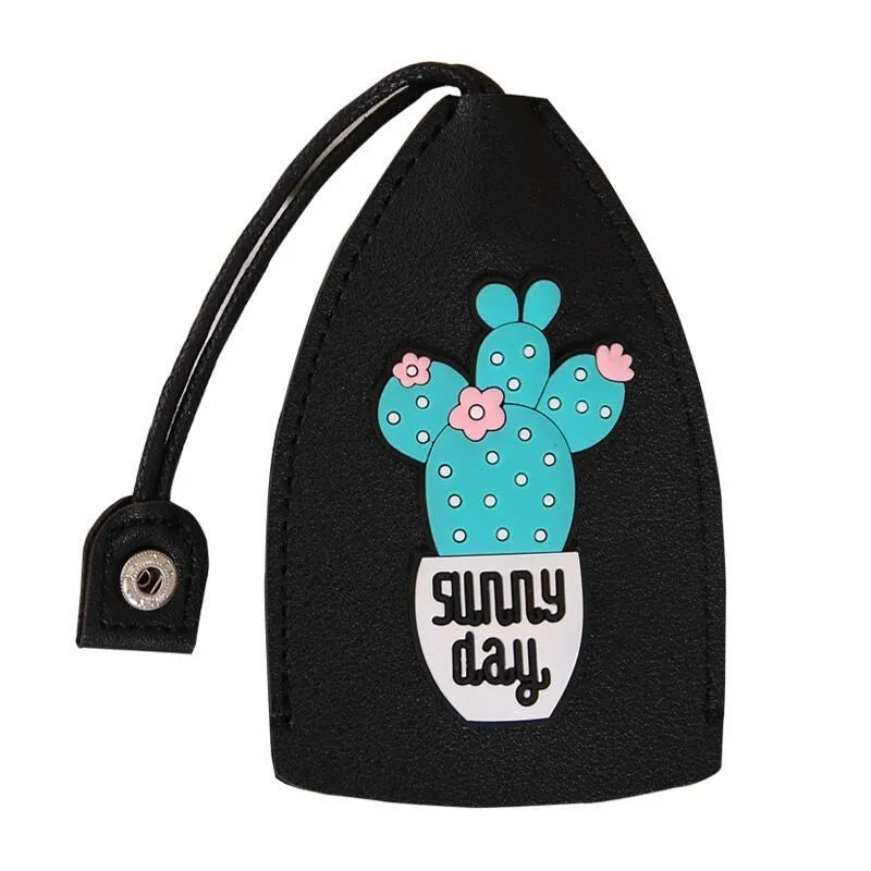 Colourful cartoon pull-out key case made from PU leather, showing the key extended from its protective sleeve.