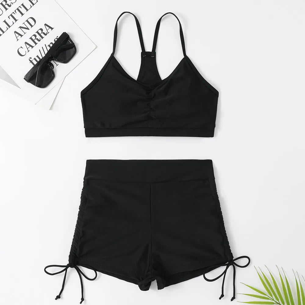 Women's high waist split swimsuit in black or purple with nylon spandex construction