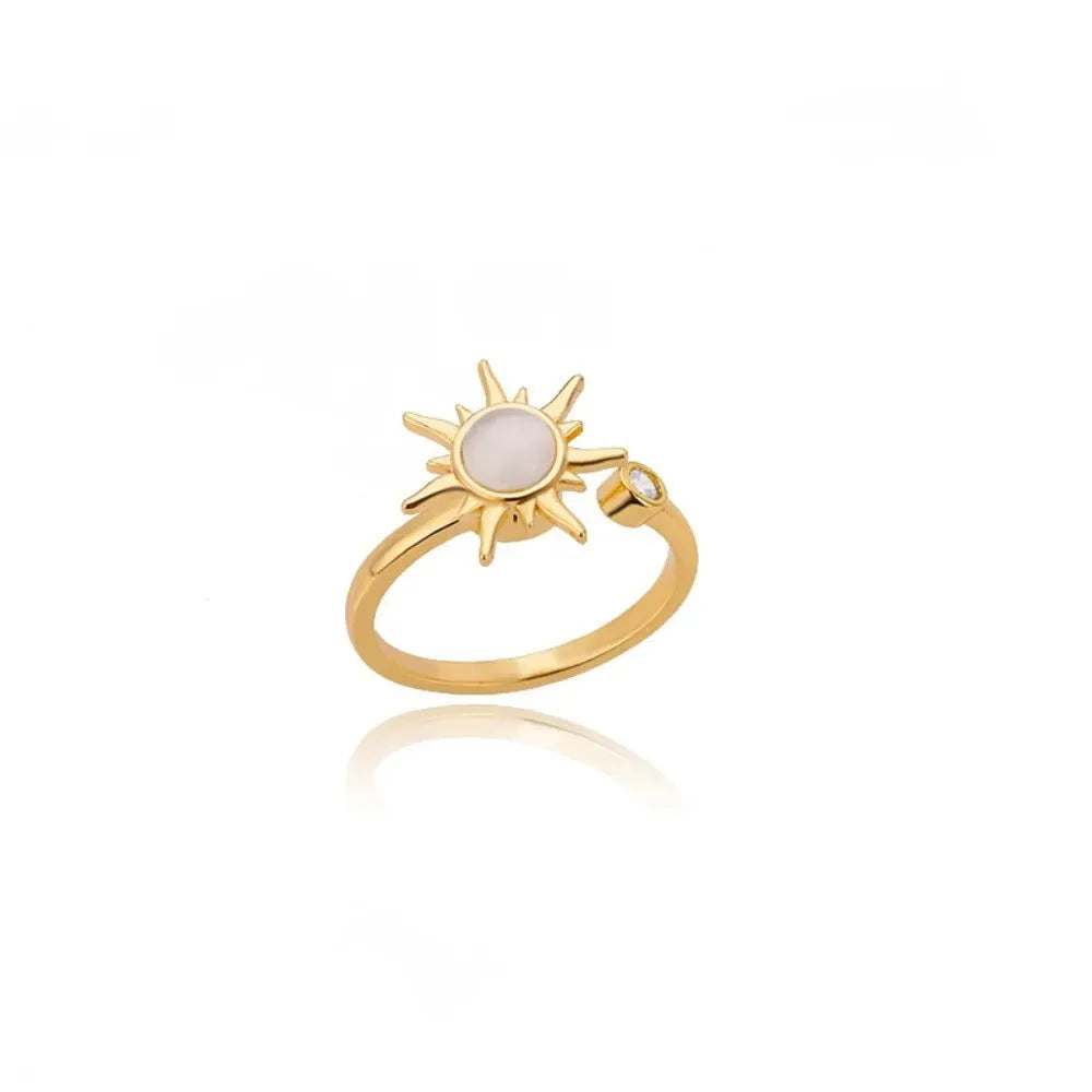 Gold and platinum electroplated copper decompression ring with rotatable design and adjustable opening