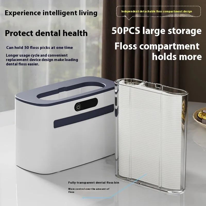 Automatic rechargeable dental floss box in dark grey, gold, and light grey colour options showing pop-up floss mechanism.