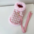 Pink polyester cat costume set with cape, beret, and hand-holding rope leash on feline model