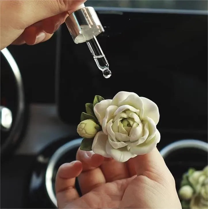 Solid jasmine car air freshener with gypsum construction for vehicle vents