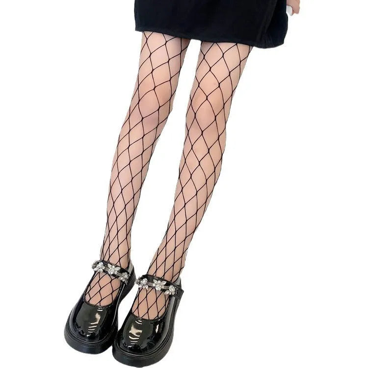 Women's mesh stockings showing large, medium and small net patterns in black and white colours