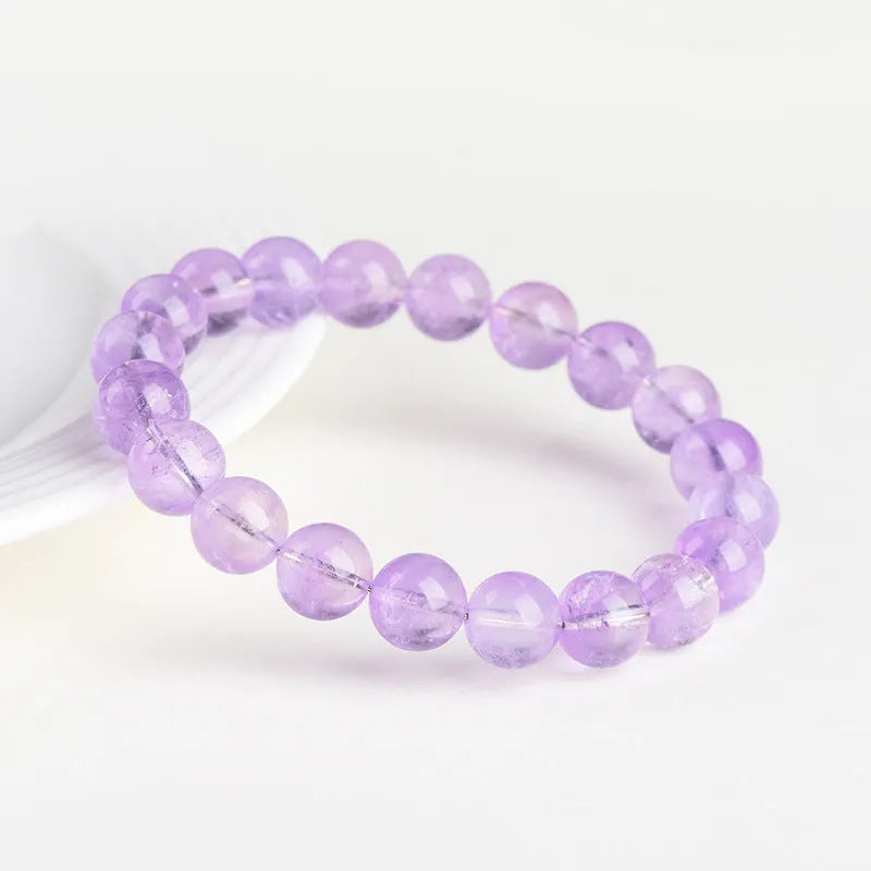 Lavender amethyst crystal bracelet with water ripple geometric pattern and round polished beads
