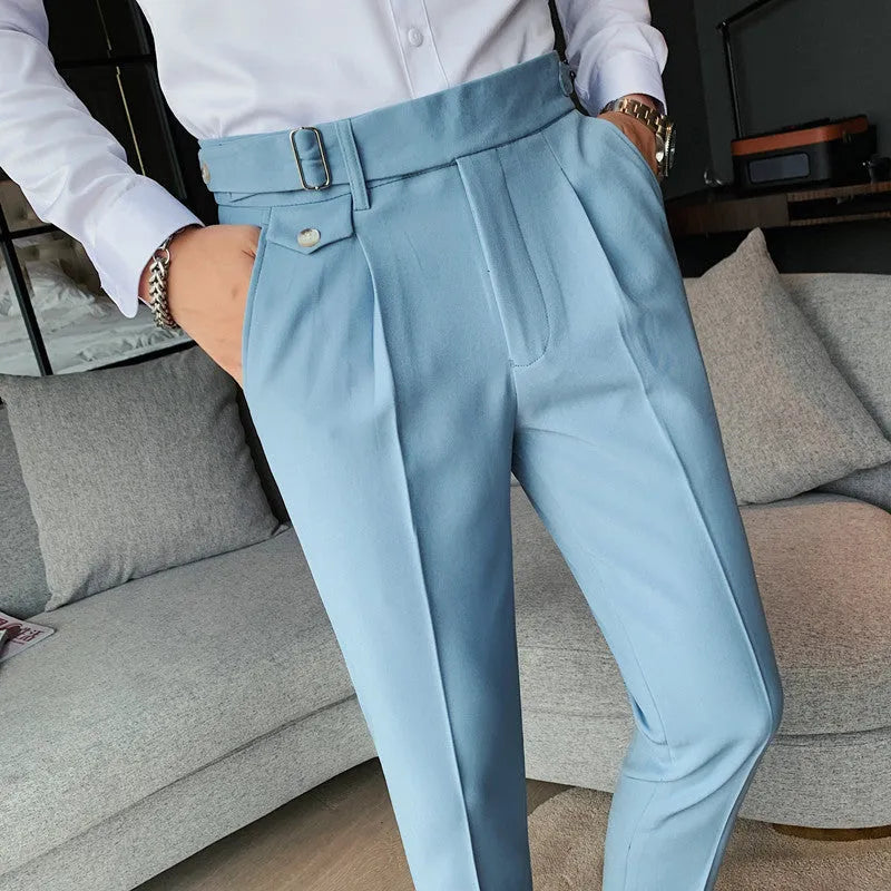 A pair of men's straight-leg casual trousers in a solid colour, laid flat to show the cut and fabric.
