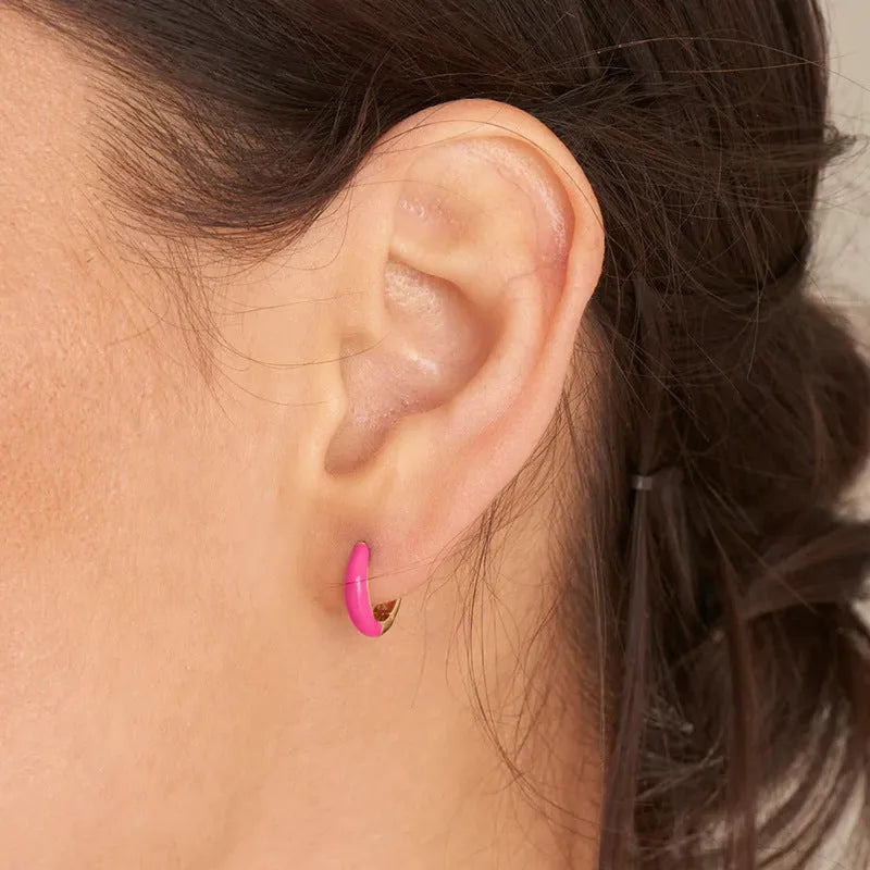A pair of colourful epoxy oval curved earrings made from silver needle copper wire in a geometric U-shape design.