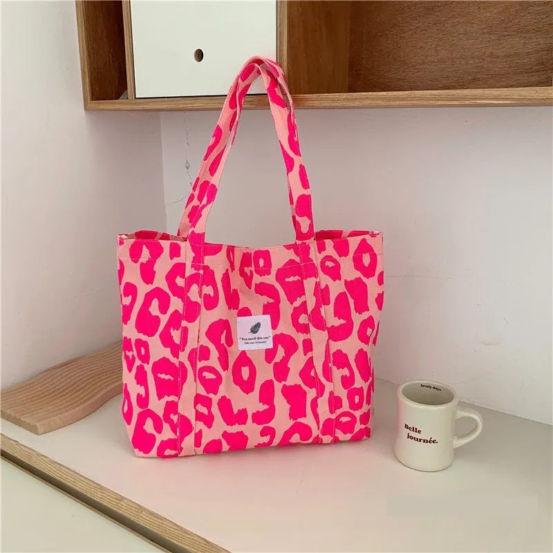 Large Oxford cloth women's shoulder bag with a three-dimensional front pocket in colour contrast option.