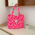 Large Oxford cloth women's shoulder bag with a three-dimensional front pocket in colour contrast option.