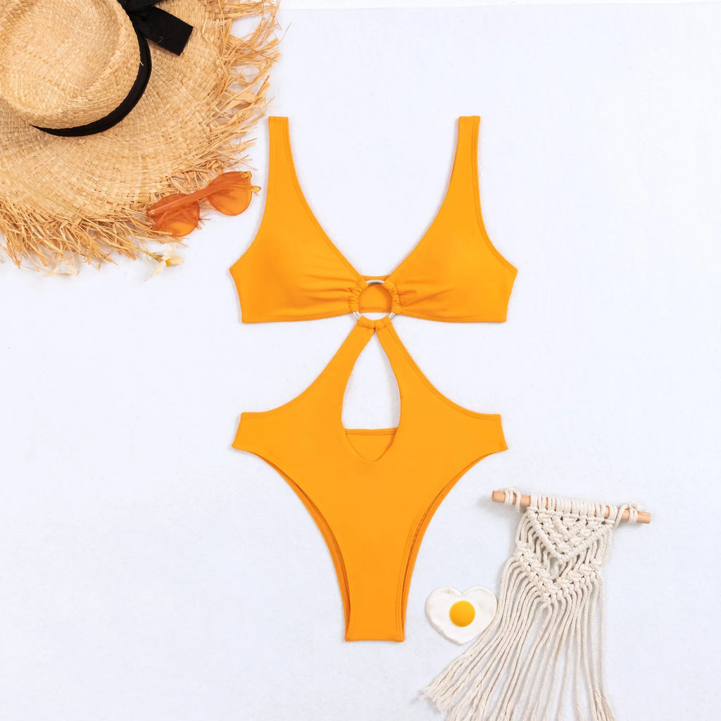 Women's black triangle one-piece swimsuit with sleeveless design on mannequin