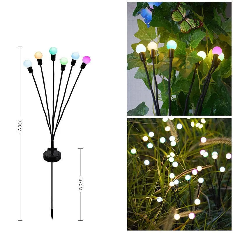 Solar-powered LED garden spike light with stainless steel ground plug stuck in soil.