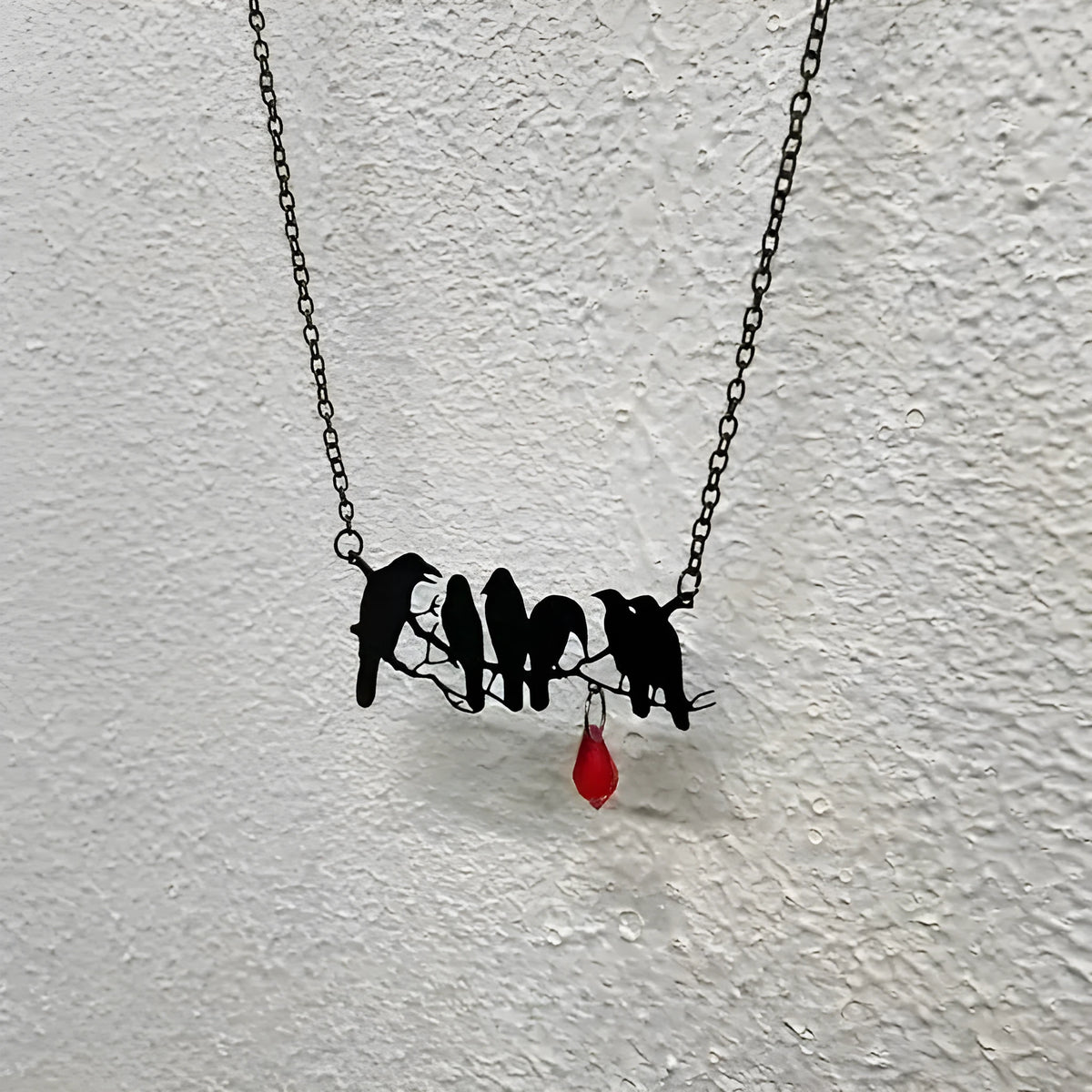 Black gothic crow pendant necklace on cross chain with electroplated alloy construction