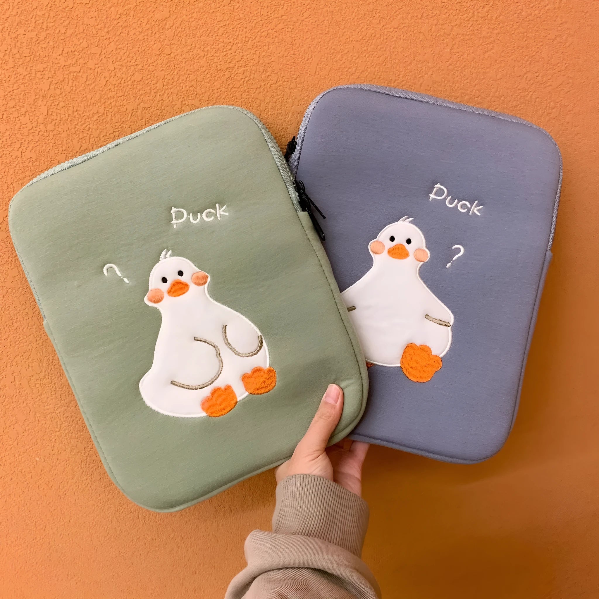 Blue cotton tablet case with duck embroidery design and zipper closure for 11-16 inch tablets