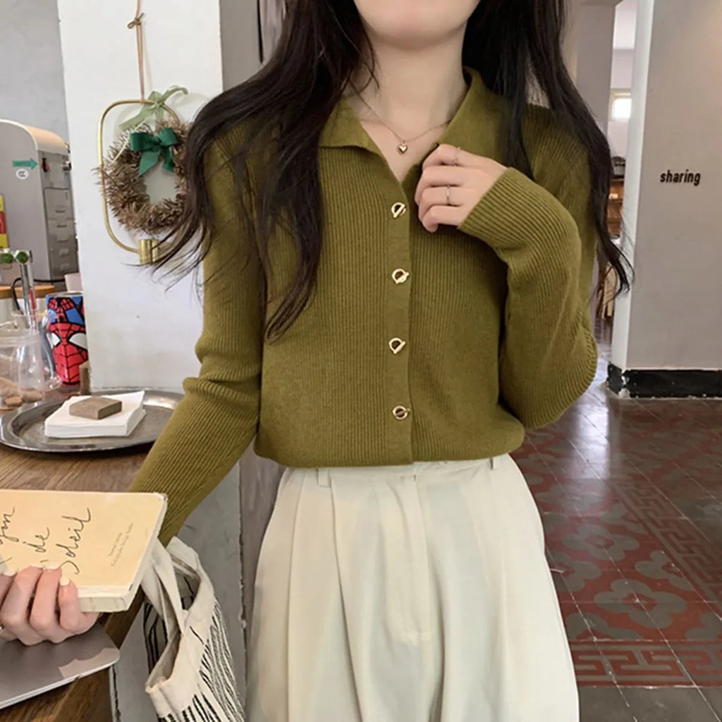 Women's beige loose-fit long-sleeved knitted cardigan top made from viscose fibre.