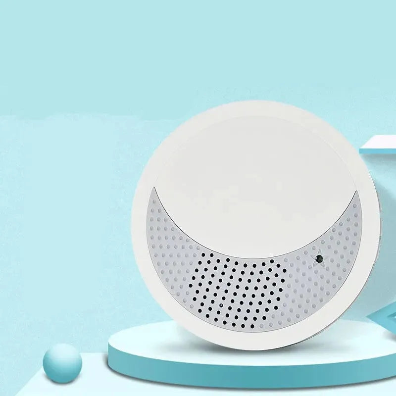 White noise sleep machine with volume knob and timer buttons showing compact portable design