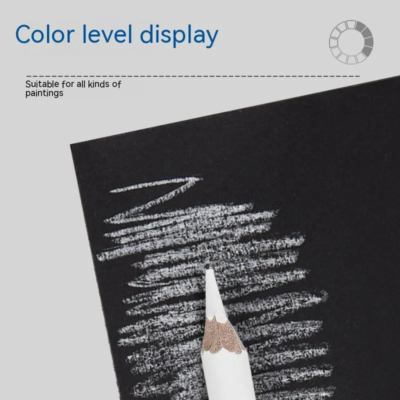 Set of three white charcoal pencils with wooden shells for highlighting and shading art on dark paper