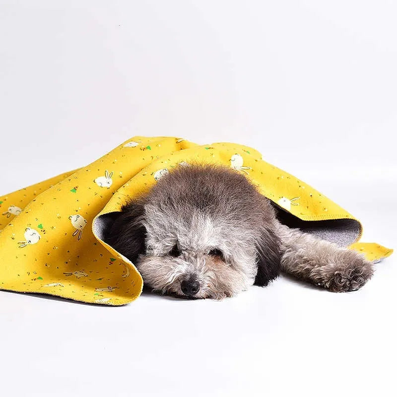 Double-sided cotton velvet pet blanket with dinosaur design shown in yellow colour