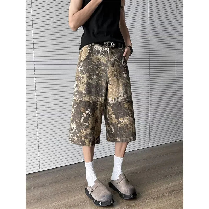Yellow cotton denim cropped jeans with a snake camouflage pattern print.