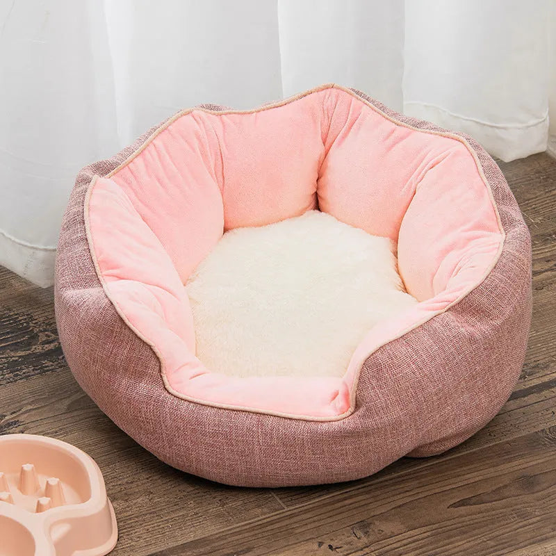 Blue octagonal pet bed with soft wool point design and removable mat for a small dog.