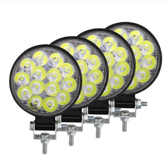White aluminium mini round 42W LED work light with IP67 waterproof rating for vehicles and machinery.