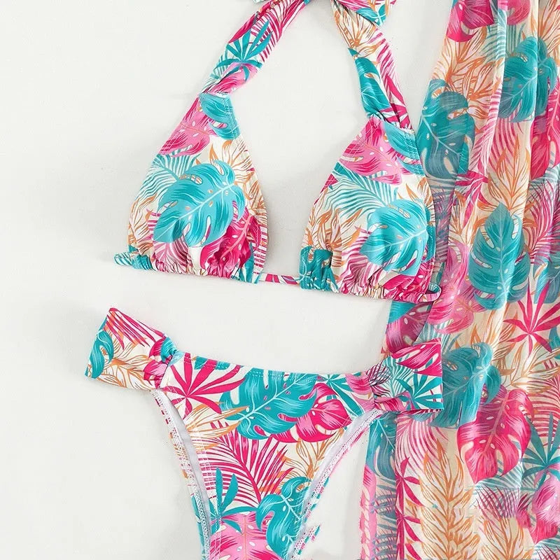 Women's three-piece swimsuit set with floral print, mesh beach skirt, and split design in picture colour.