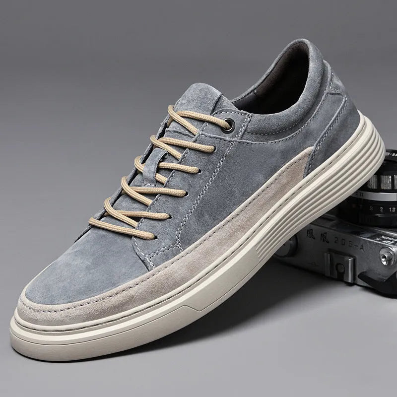 Men's grey casual leather skate shoes with rubber sole and round toe design