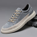 Men's grey casual leather skate shoes with rubber sole and round toe design