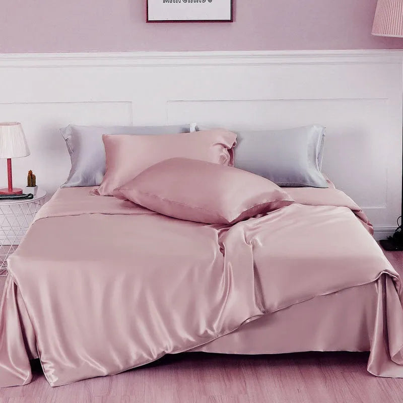 Silk duvet cover in Lotus Pink colour showing double-sided bedding with plain weave texture
