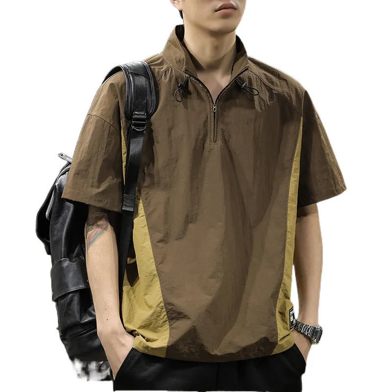 Man wearing a brown half-zip stand collar short sleeve shirt made of Ice Silk fabric.