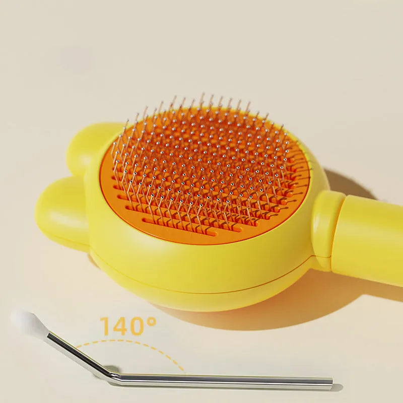 Green self-cleaning pet grooming brush with release button and stainless steel comb teeth.