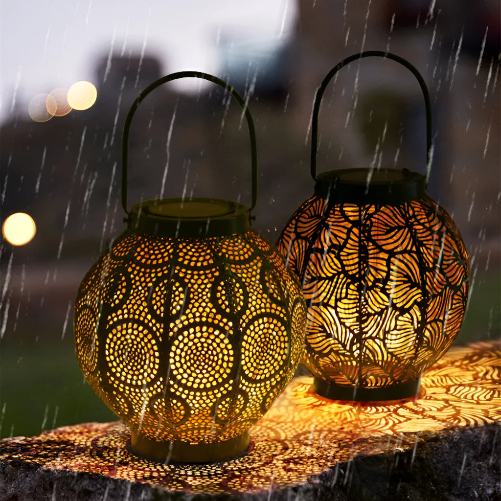 Decorative hollow iron solar courtyard lamp with integrated solar panel and warm white LED illumination