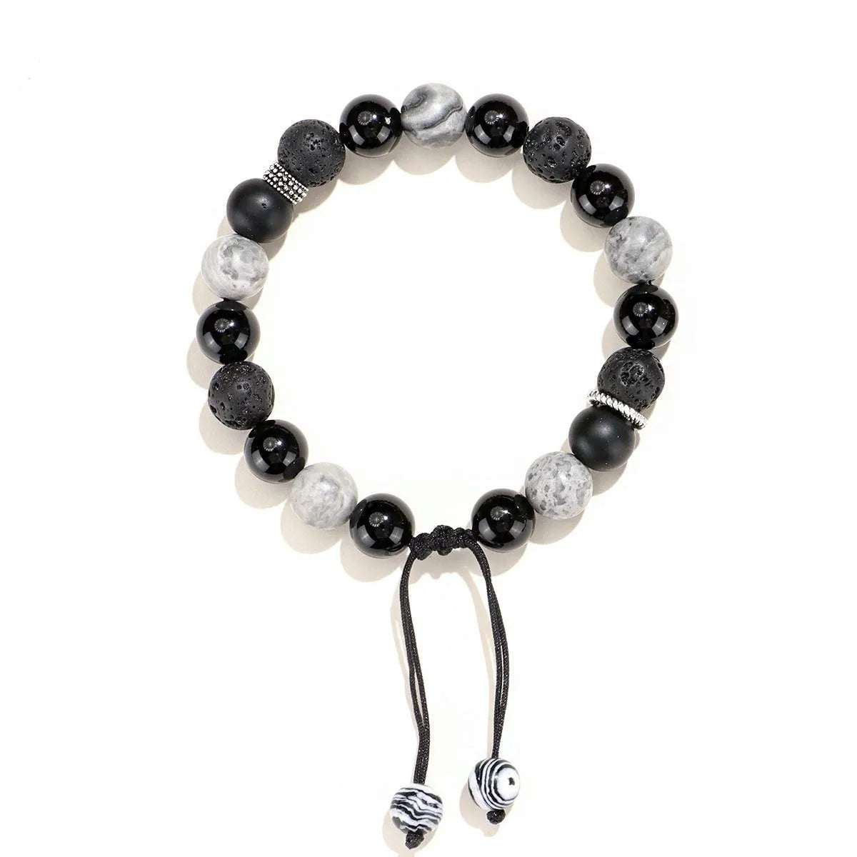 Black agate map stone diamond-shaped volcanic rock bracelet on a wrist, showing New Chinese style.