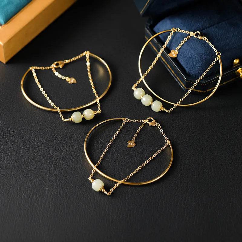 Hetian jade lucky beads bracelet for women with gold inlay, shown in single, double and three bead versions.