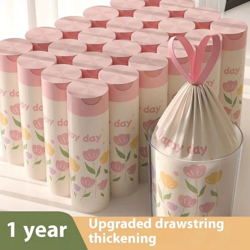 Pink degradable argy wormwood mosquito repellent garbage bags with drawstring, size 44cm x 48cm.