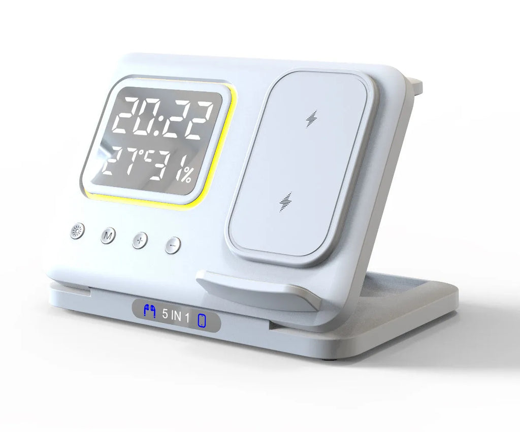 Black wireless charging station with digital clock display showing time and temperature, charging smartphone and smartwatch