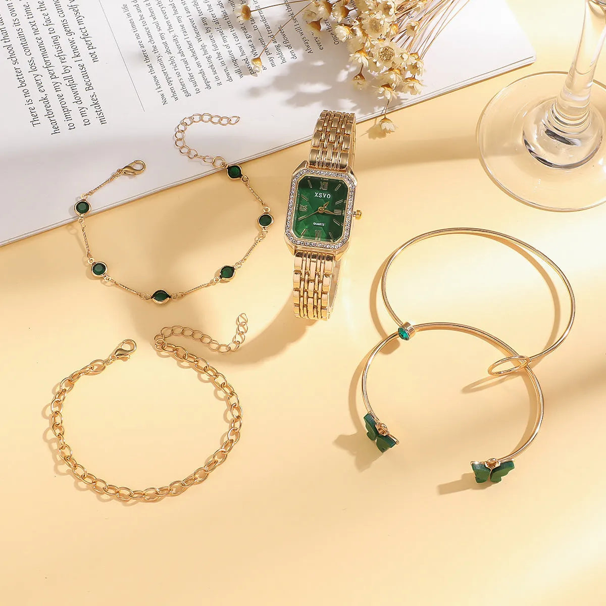 Gold green square steel ladies watch with four matching butterfly bracelets in complete fashion jewellery set