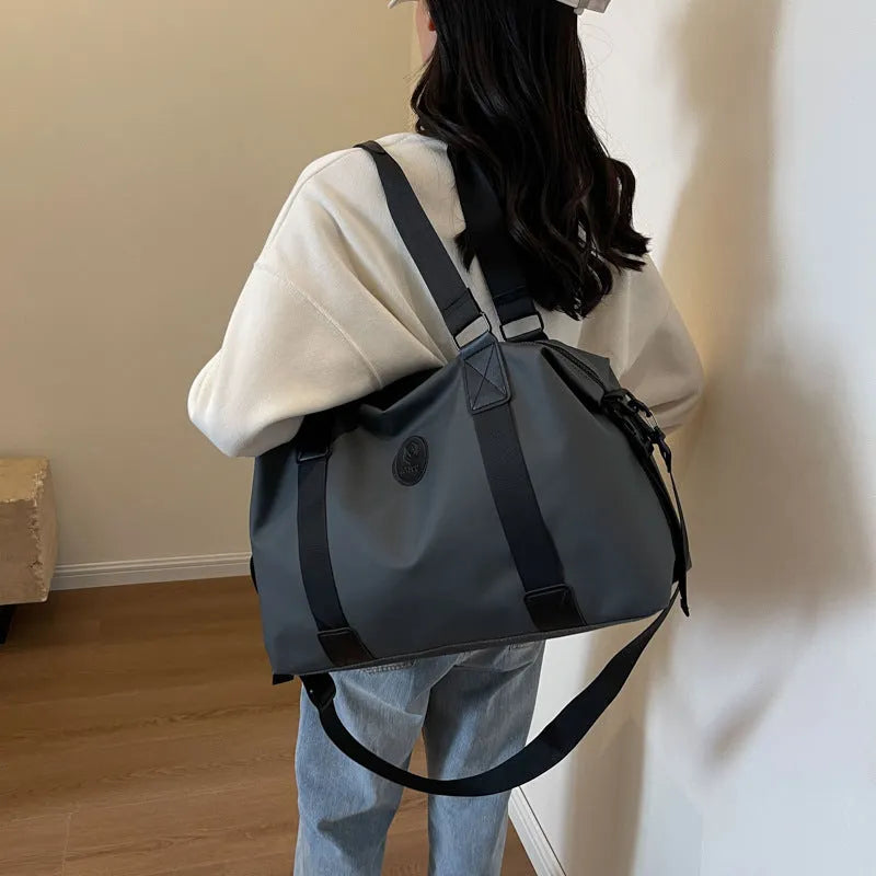 Large black waterproof Oxford cloth travel backpack with breathable straps and multiple compartments