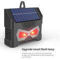 Black animal-shaped solar ultrasonic repeller with charging cable for outdoor pest control