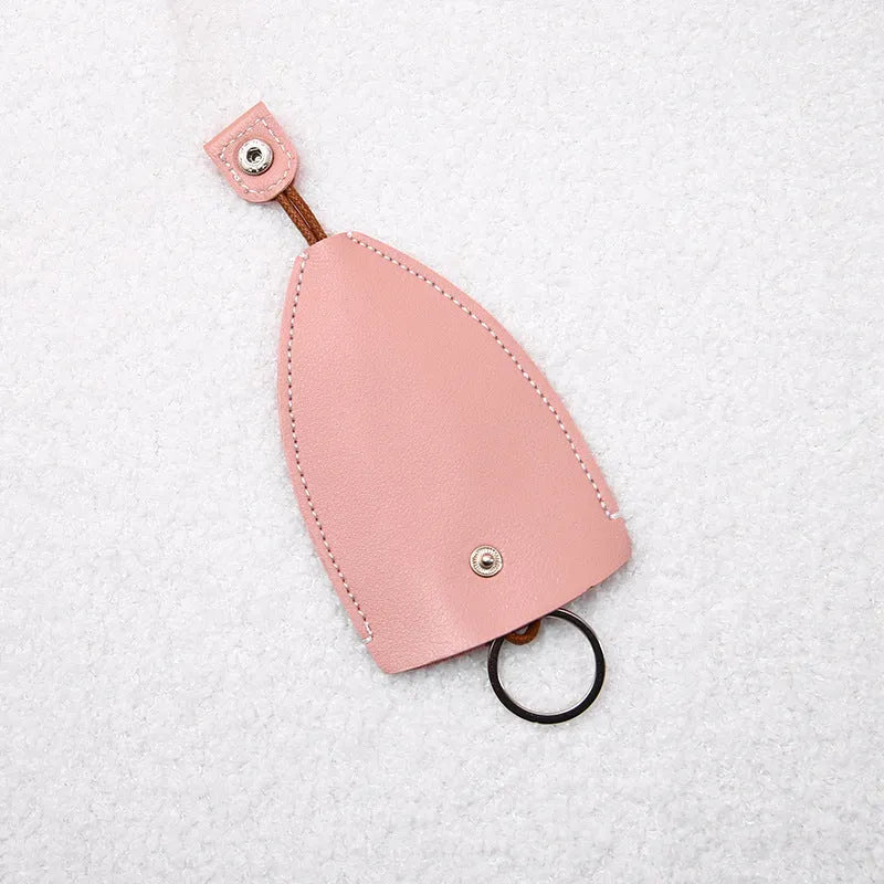 Colourful cartoon pull-out key case made from PU leather, showing the key extended from its protective sleeve.