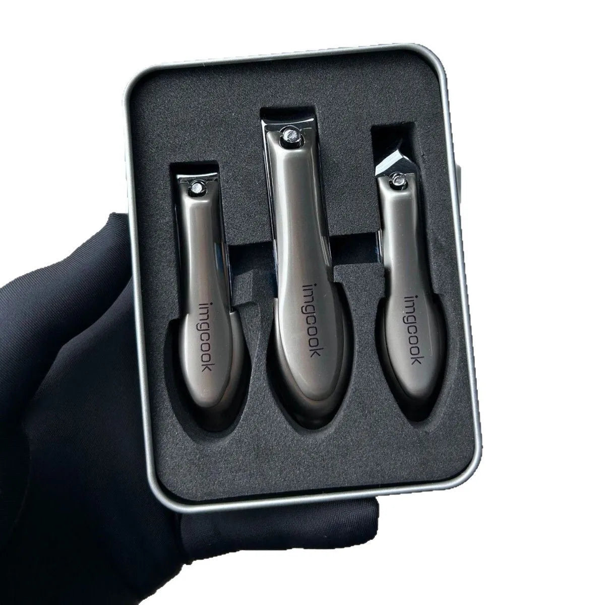 Three-piece anti-splash nail clipper set in black alloy and stainless steel for daily nail care