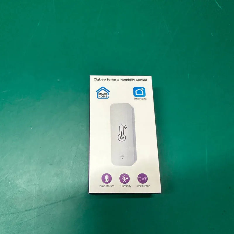 Compact white ABS temperature and humidity sensor with WiFi connectivity for wireless environmental monitoring